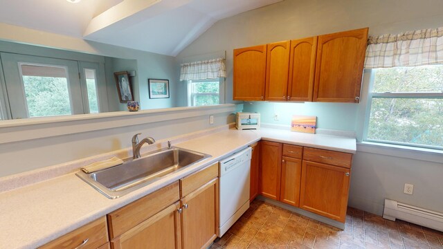 kitchen featuring lofted ceiling, a baseboard heating unit, white dishwasher, and sink