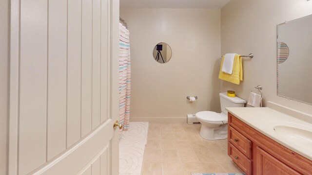 bathroom with vanity, tile patterned flooring, toilet, and a shower with shower curtain