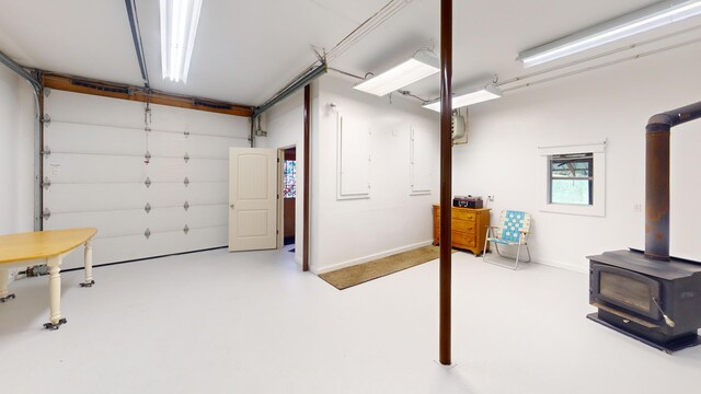 garage featuring a wood stove