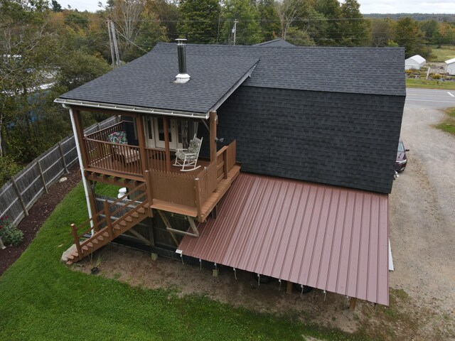 exterior space featuring a wooden deck