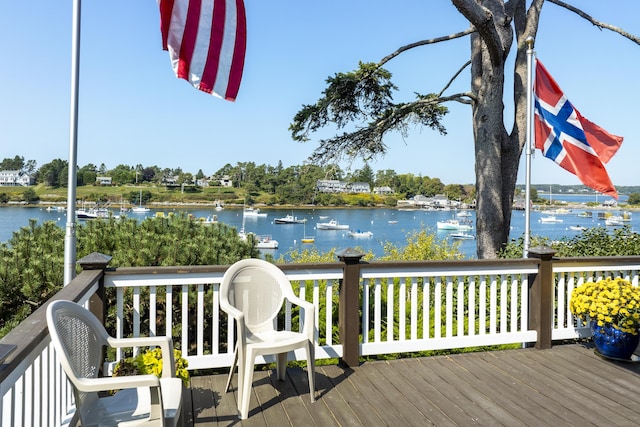 12 Steamboat Wharf Ln, Harpswell, ME 04079 - wooden deck with a water view