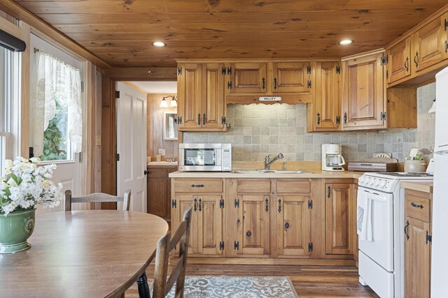 12 Steamboat Wharf Ln, Harpswell, ME 04079 - kitchen featuring white range with gas stovetop, light countertops, stainless steel microwave, wooden ceiling, and a sink