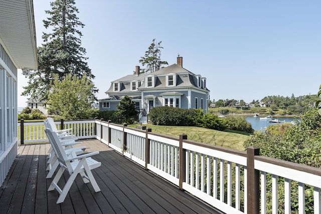 12 Steamboat Wharf Ln, Harpswell, ME 04079 - wooden terrace with a water view