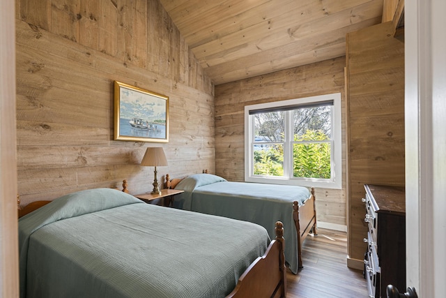 12 Steamboat Wharf Ln, Harpswell, ME 04079 - bedroom with wood walls, wood ceiling, vaulted ceiling, and wood finished floors