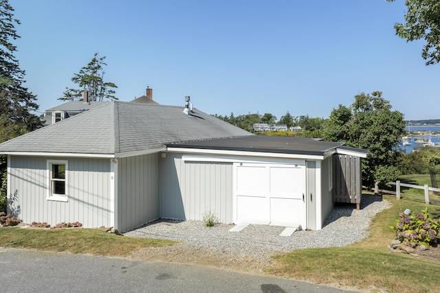 12 Steamboat Wharf Ln, Harpswell, ME 04079 - detached garage featuring fence