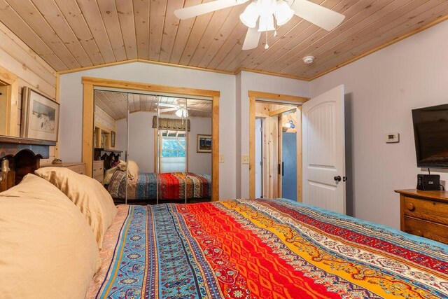 bedroom with wood ceiling, lofted ceiling, crown molding, and ceiling fan