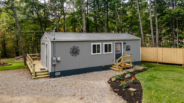 view of outdoor structure featuring a yard