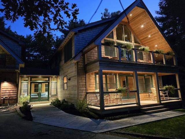 back house at night with covered porch