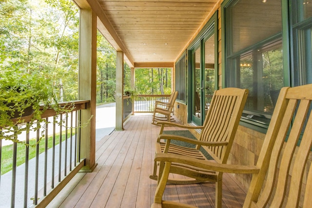 wooden deck featuring a porch