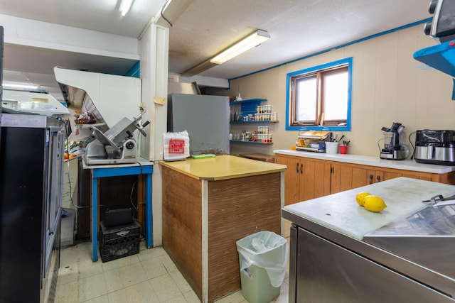 kitchen with a textured ceiling