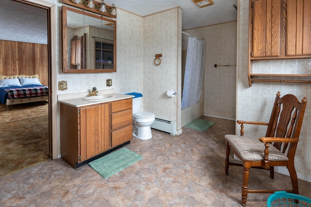 full bathroom featuring a baseboard heating unit, a textured ceiling, shower / bath combo with shower curtain, vanity, and toilet