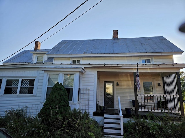 bungalow-style home with a porch