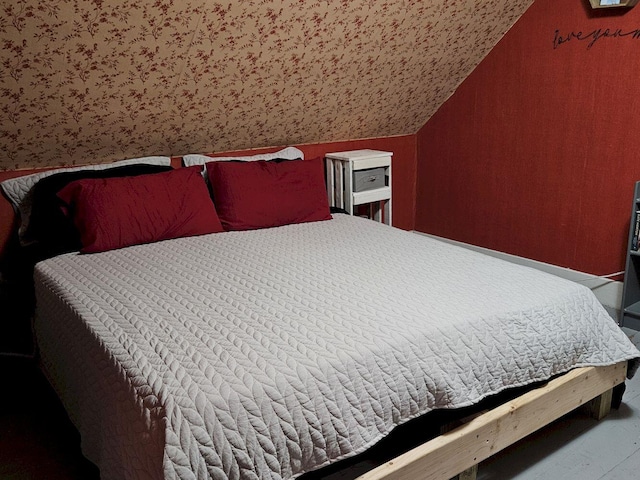 bedroom with vaulted ceiling