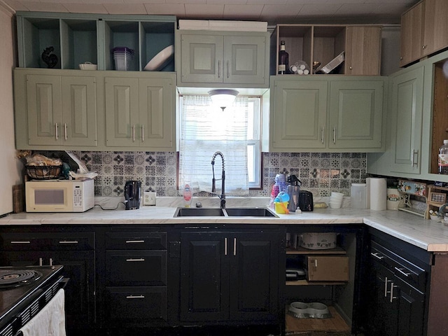 kitchen featuring decorative backsplash and sink