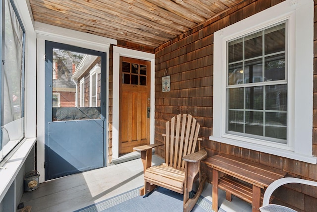 exterior space with wood ceiling