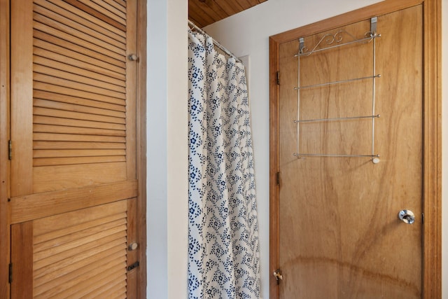 bathroom with a shower with shower curtain