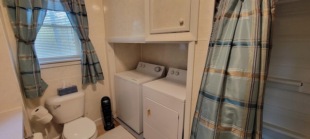 laundry room with washer and dryer