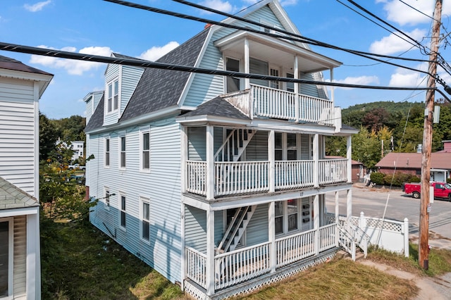 exterior space featuring a balcony