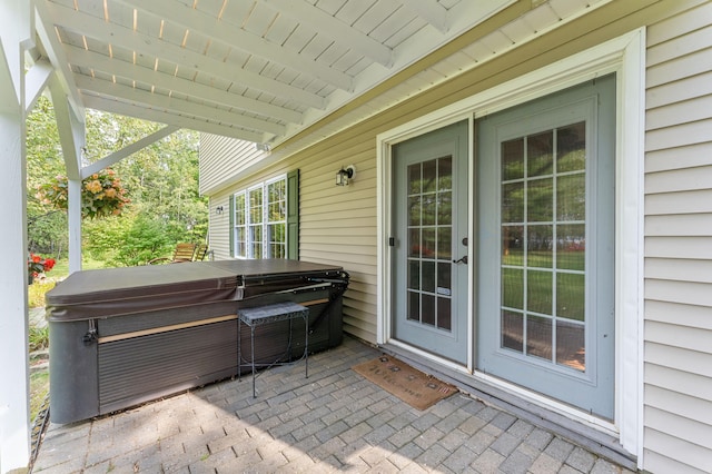 view of patio featuring a hot tub