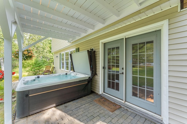 view of patio featuring a hot tub