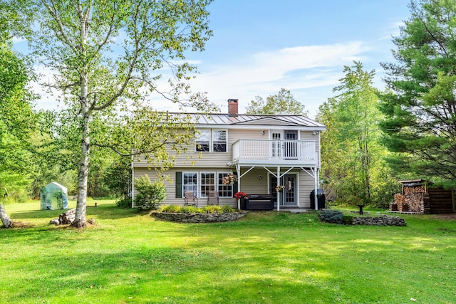 view of front of house featuring a front lawn