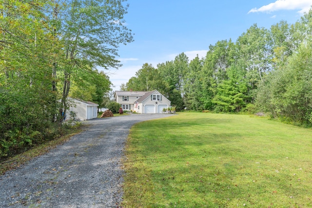 view of yard with a garage