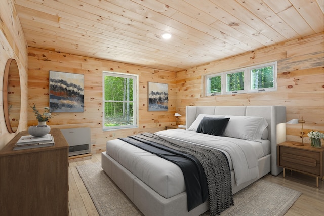 bedroom featuring light wood-type flooring, wood walls, multiple windows, and wooden ceiling