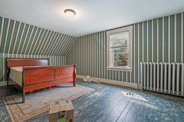 bedroom featuring radiator heating unit, wallpapered walls, baseboards, and wood-type flooring