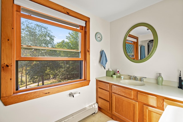 bathroom featuring vanity and a baseboard heating unit