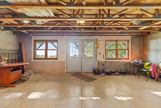 misc room with concrete flooring and plenty of natural light