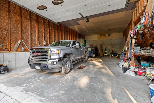 garage with a workshop area