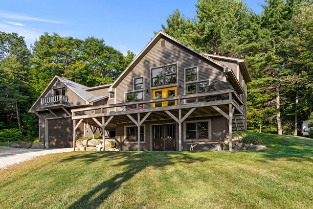 view of front of property featuring a balcony, a front yard, and a deck