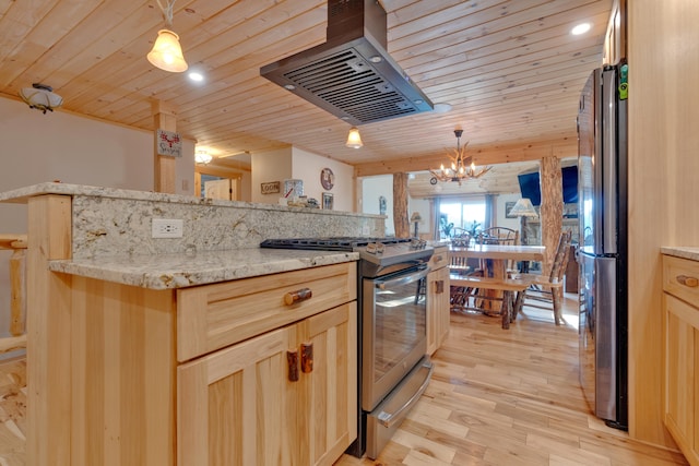 kitchen with an inviting chandelier, light wood-type flooring, light brown cabinets, and appliances with stainless steel finishes