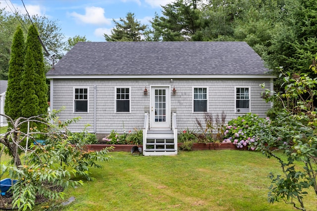 view of front of home featuring a front yard