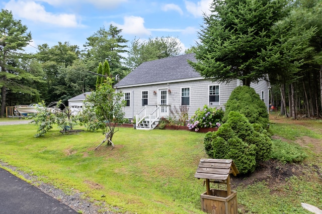 view of front of home with a front lawn