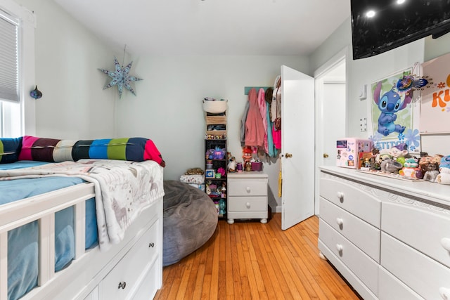 bedroom featuring light hardwood / wood-style flooring