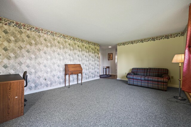 unfurnished room with dark carpet