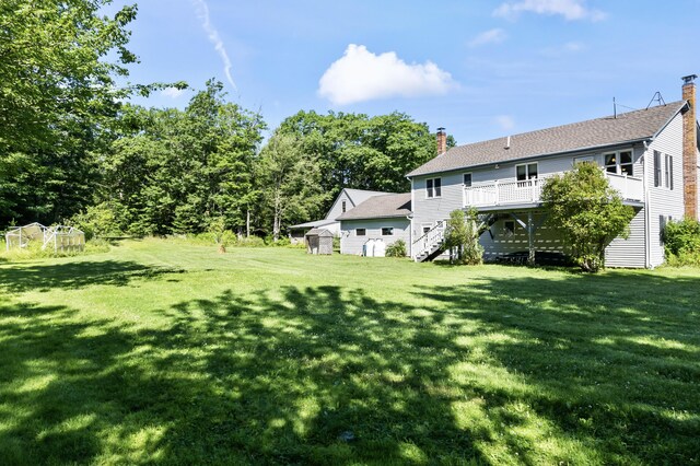 view of yard featuring a deck