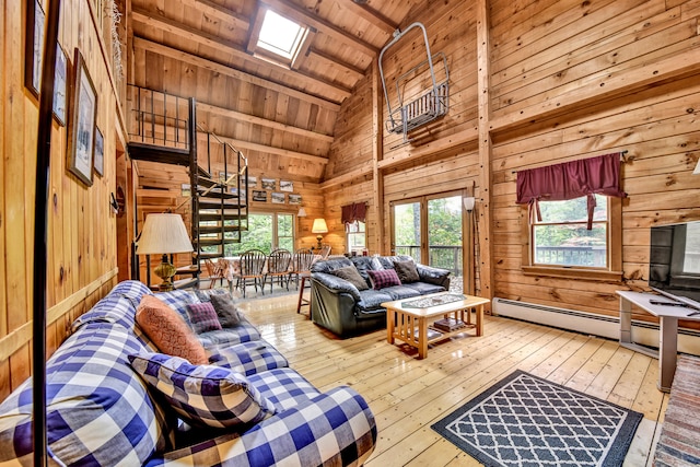 living room with wooden ceiling, light wood-type flooring, a skylight, high vaulted ceiling, and beam ceiling