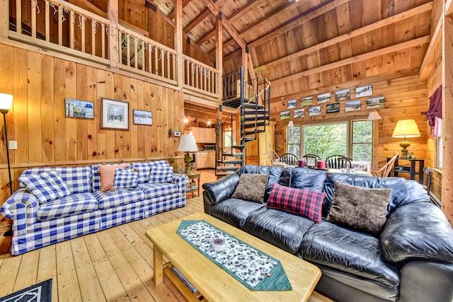 living room featuring wooden ceiling, wood walls, wood-type flooring, high vaulted ceiling, and beam ceiling