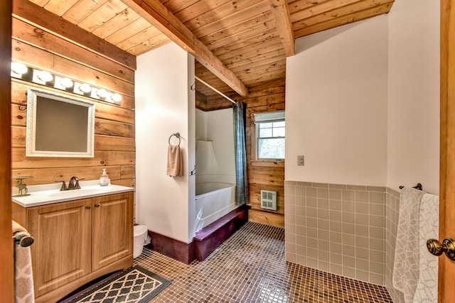 full bathroom featuring beamed ceiling, shower / bath combo, wood walls, vanity, and wood ceiling