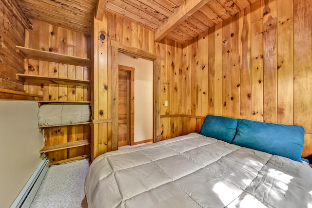 bedroom with wood walls, wood ceiling, carpet floors, beam ceiling, and a baseboard radiator