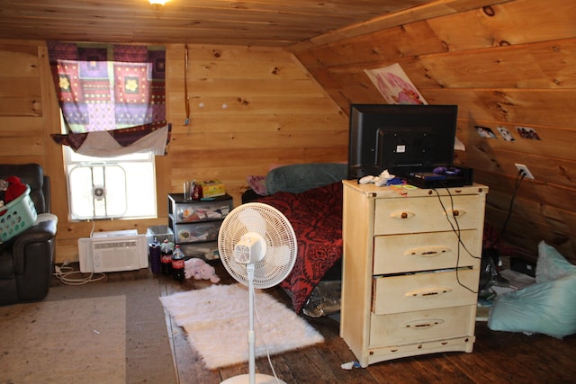 bedroom featuring wood walls, wood ceiling, dark hardwood / wood-style floors, and vaulted ceiling