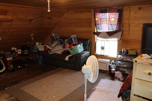 interior space with wooden walls, hardwood / wood-style flooring, and wooden ceiling