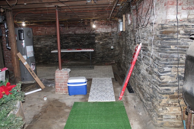 basement with hybrid water heater