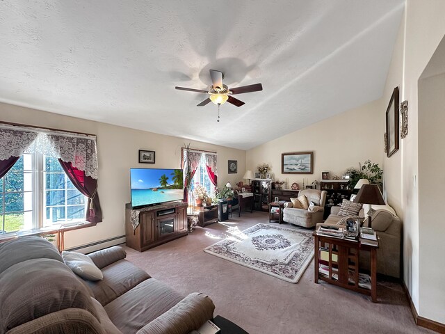 living room with a baseboard heating unit, lofted ceiling, ceiling fan, and carpet flooring