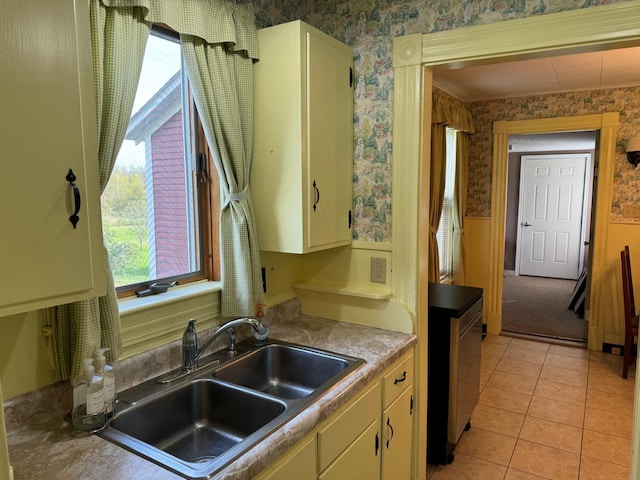 37 Fisher St, Fort Fairfield, ME 04742 - kitchen with wallpapered walls, a sink, wainscoting, and plenty of natural light