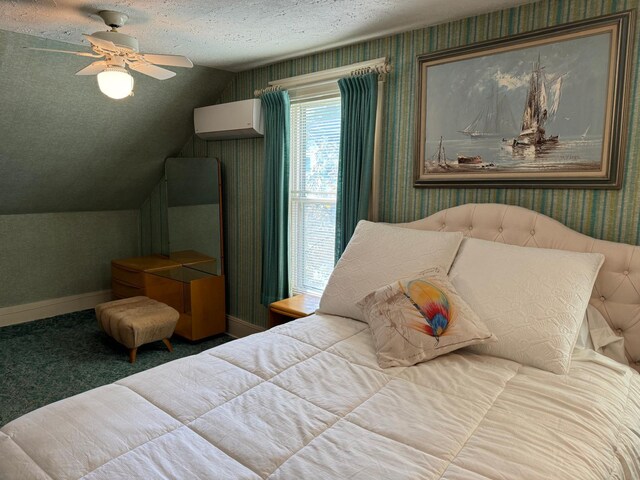 bedroom featuring a textured ceiling, ceiling fan, a wall mounted air conditioner, vaulted ceiling, and carpet flooring