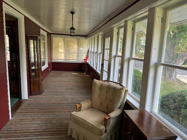 37 Fisher St, Fort Fairfield, ME 04742 - sunroom featuring a wealth of natural light, carpet flooring, and ornamental molding