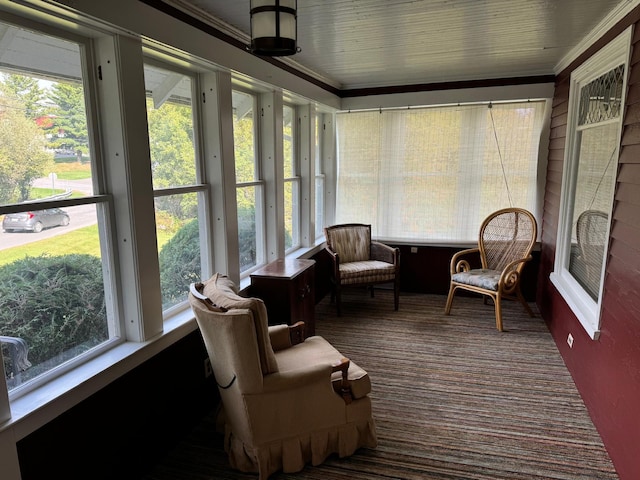 37 Fisher St, Fort Fairfield, ME 04742 - sunroom with plenty of natural light, carpet flooring, and crown molding